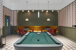 Cozy 2BR near Harvard with Gym, Golf & Work Space - Image 2