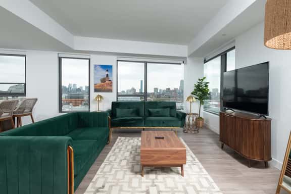 Central Upscale 2BR Condo wGym Office & Parking - Image 1