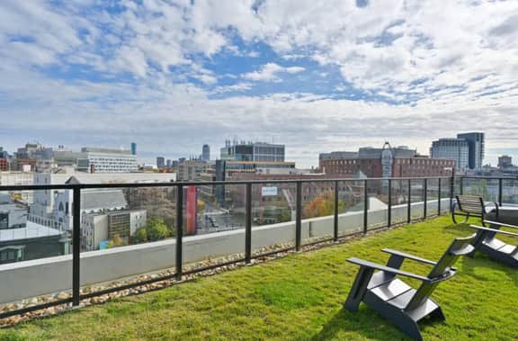 Central Square 2BR Condo near Harvard & MIT Spacious Gym & Work - Image 2